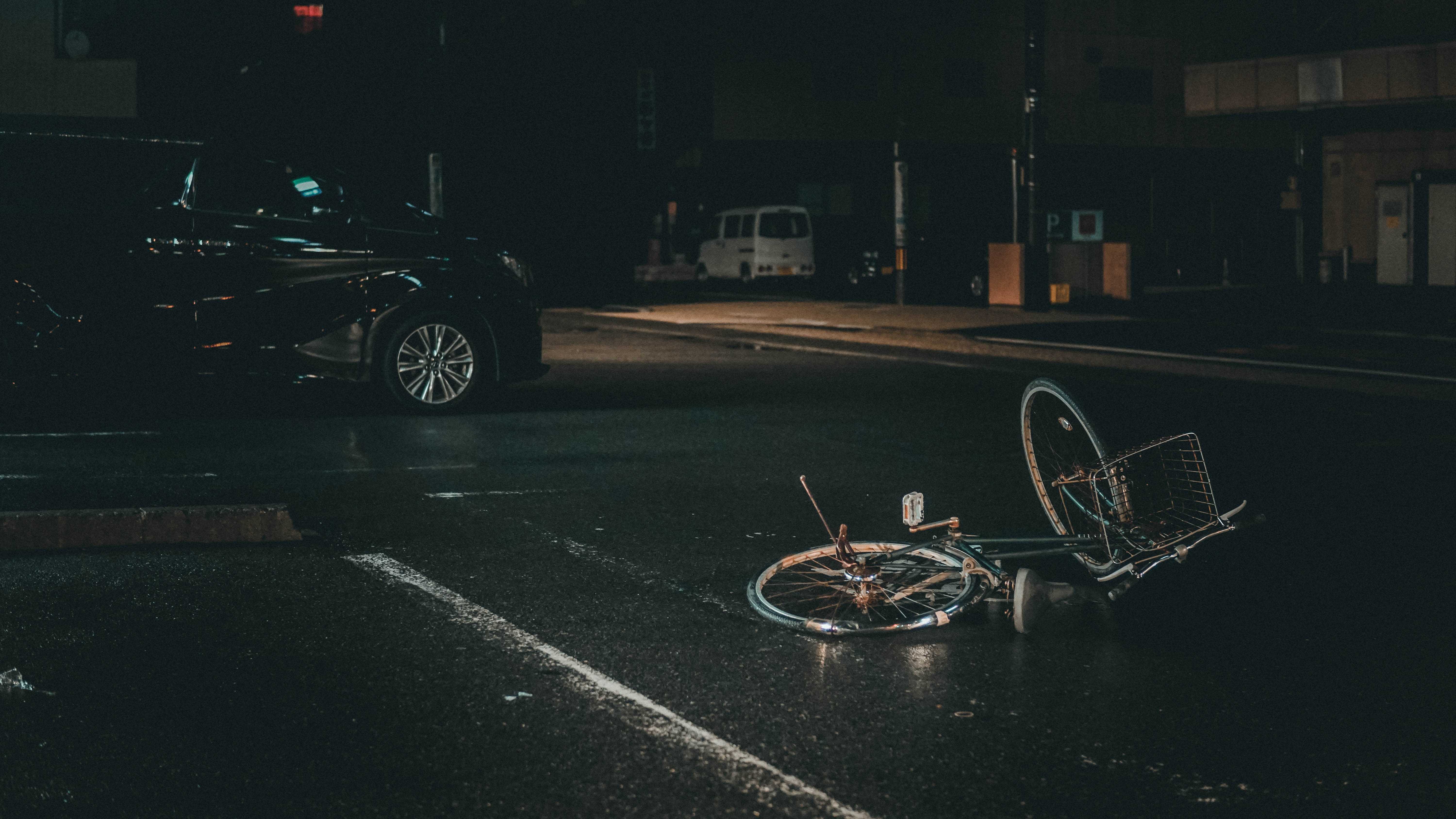 Photo of an automobile accident involving a van and a bicycle